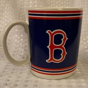 Boston Red Sox mug, blue, white and red with team name and logo. 4 inches tall.